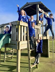 Crudgington Primary School pupils celebrating their Ofsted Good rating scaled