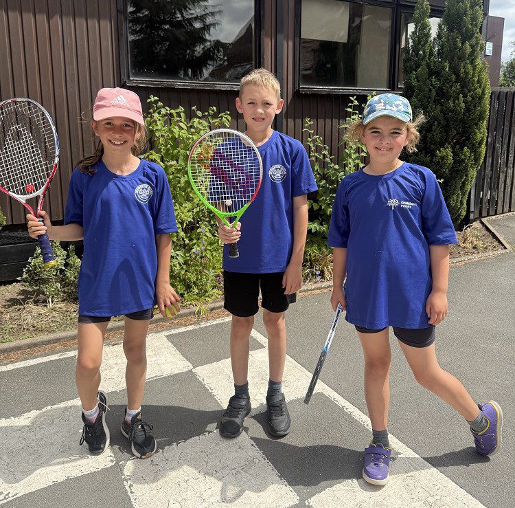 Anyone for tennis... Olivia Moore, Matthew Evans, and Sadie Brown